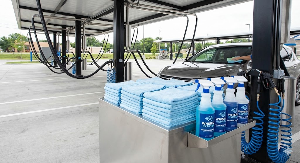Whistle Express Car Wash Prices: A clean vacuum station at Whistle Express with free towels and spray bottles